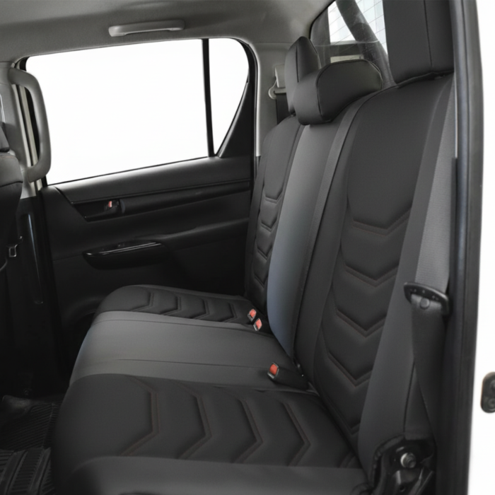 Cubreasientos traseros para Nissan Frontier Doble cabina 2020-2026 línea Sportline en tactopiel negro con logotipo plata